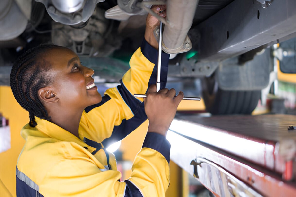 https://www.istockphoto.com/photo/a-woman-in-uniform-working-underneath-a-car-that-is-lifted-on-a-hydraulic-lift-rack-gm2007558137-560586848?searchscope=image%2Cfilm