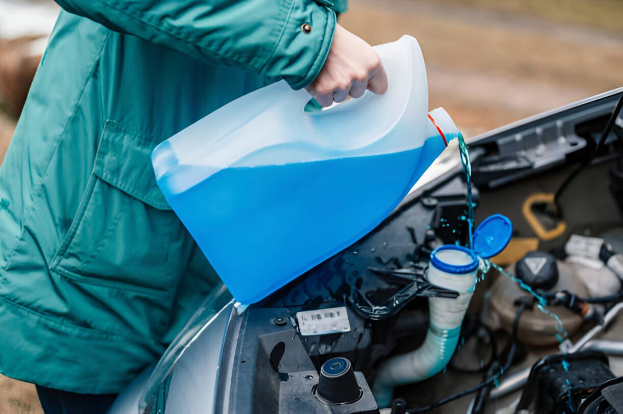 https://www.istockphoto.com/photo/pouring-antifreeze-filling-a-windshield-washer-tank-with-an-antifreeze-in-winter-gm1313968514-402324439?searchscope=image%2Cfilm